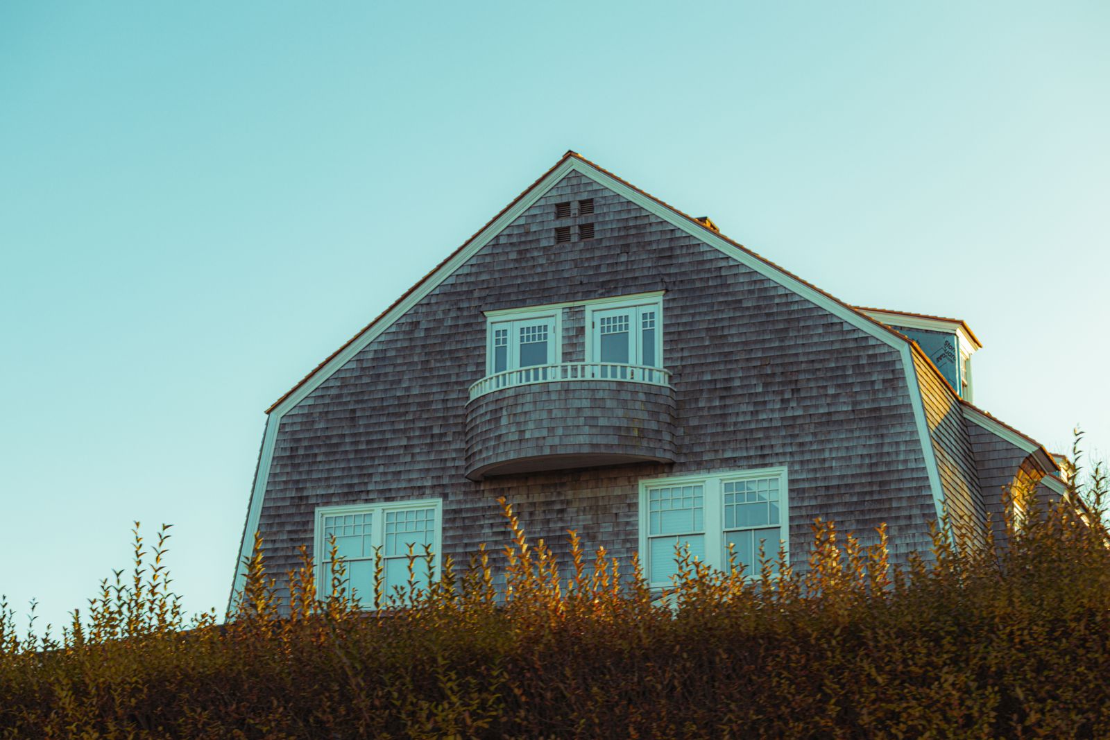 Home with a weathered cedar shake roof